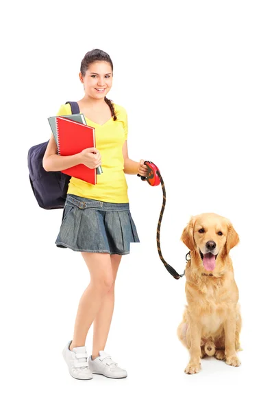 Студентка с собакой — стоковое фото
