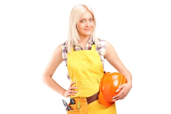 Vrouwelijke werknemer met gereedschap riem — Stockfoto