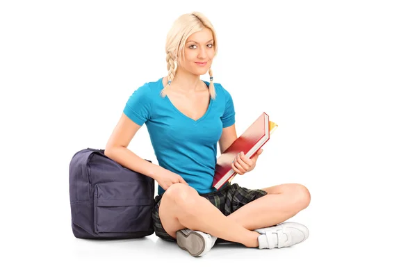 Female student holding books — Stock Photo, Image