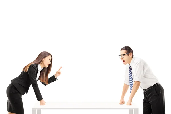 Businessman yelling at businesswoman — Stock Photo, Image