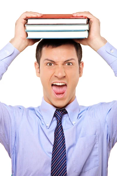 Student holding book over head — Stock Photo, Image