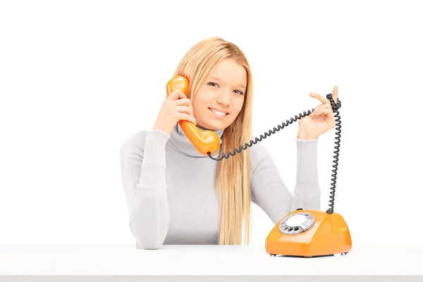 Female talking on retro phone — Stock Photo, Image