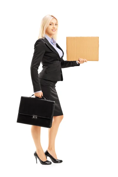 Woman holding piece of carboard — Stock Photo, Image