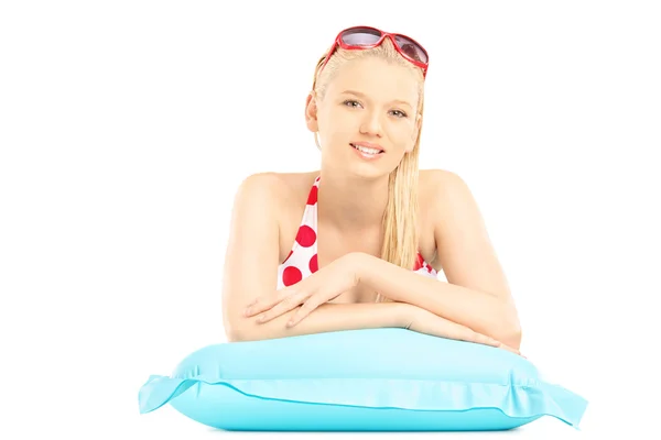 Female on swimming mattress — Stock Photo, Image