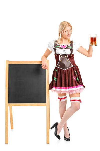 Woman holding beer glass — Stock Photo, Image