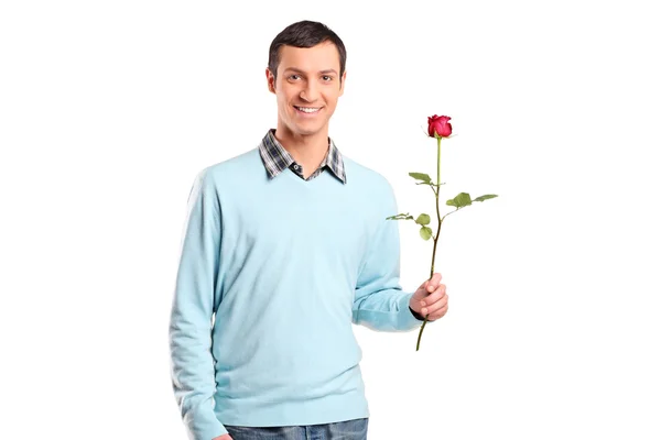 Lächelnder Mann mit Rosenblüte — Stockfoto