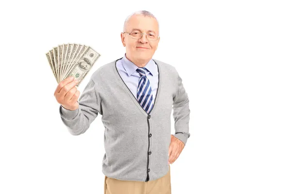 Senior gentleman bedrijf geld — Stockfoto