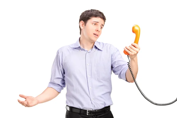 Man holding telephone — Stock Photo, Image