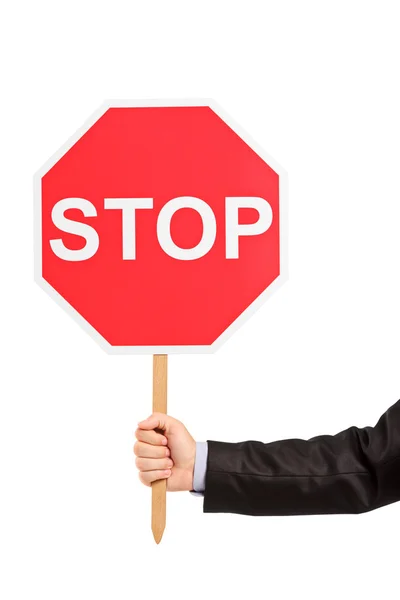 A hand holding a traffic sign stop — Stock Photo, Image