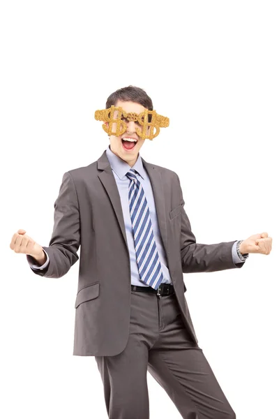Empresário vestindo óculos de sinal dólar — Fotografia de Stock