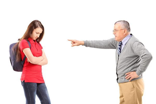 Angry grandfather shouting at niece — Stock Photo, Image