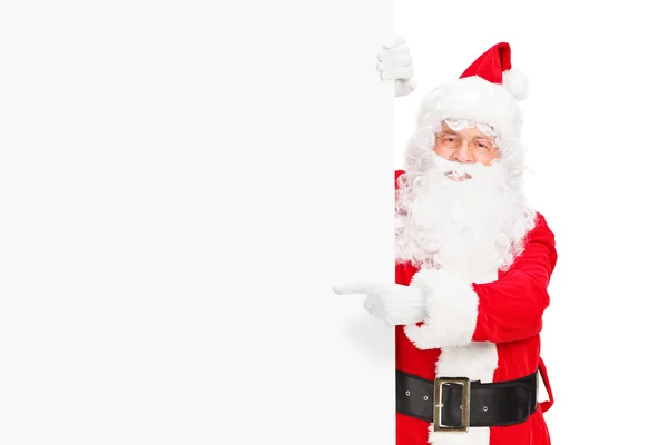 Santa claus naast leeg reclamebord — Stockfoto