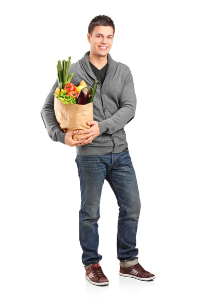 Male holding paper bag — Stock Photo, Image