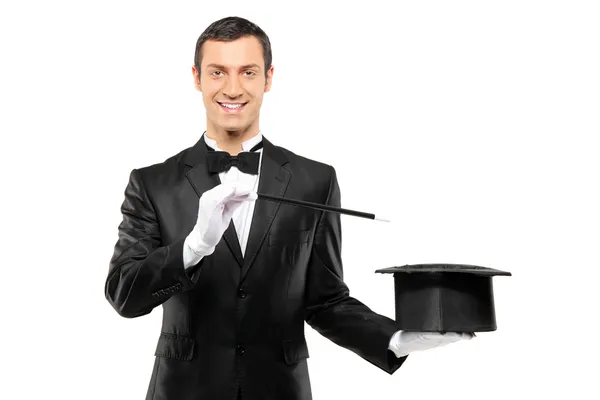 Magician holding empty top hat — Stock Photo, Image