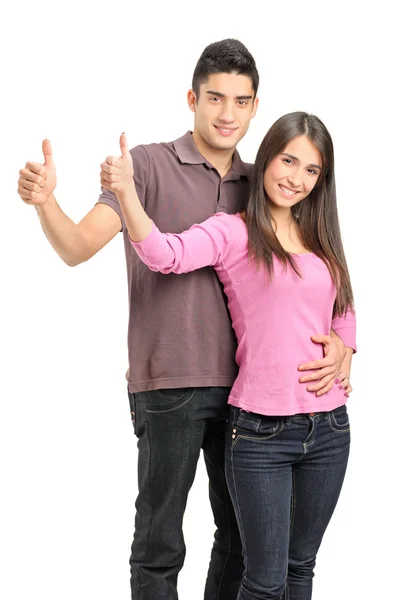 Lyckliga paret ger tummen upp — Stockfoto