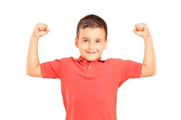 Strong boy showing muscles — Stock Photo, Image