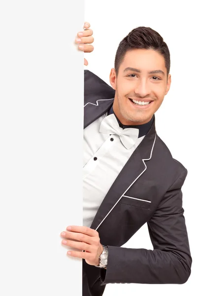 Guy posing behind blank panel — Stock Photo, Image