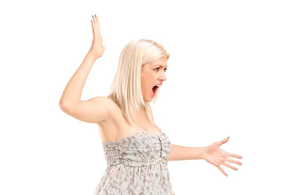 Nervous blond female shouting — Stock Photo, Image