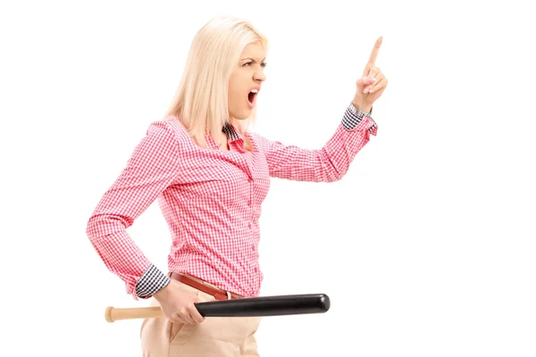 Woman holding baseball bat, threatening — Stock Photo, Image