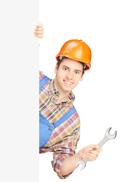 Manual worker with helmet, wrench — Stock Photo, Image