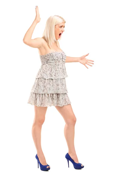 Nervous blond female shouting — Stock Photo, Image