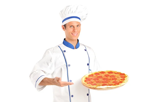 Chef che tiene la pizza — Foto Stock