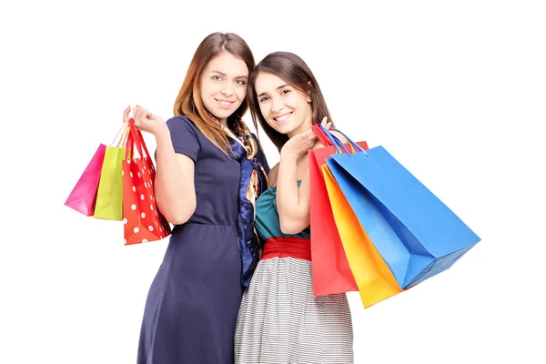 Dos mujeres con bolsas de compras — Foto de Stock