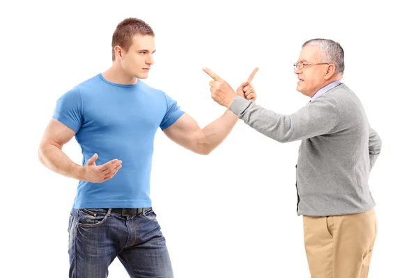 Chico y hombre maduro discutiendo —  Fotos de Stock