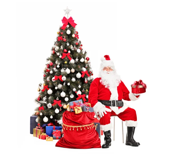 Santa Claus with gift — Stock Photo, Image