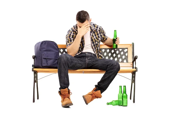 Drunk male teenager on bench — Stock Photo, Image