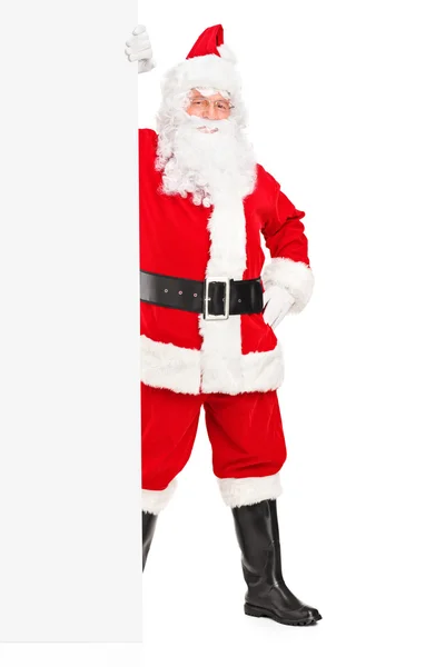 Papai Noel ao lado de outdoor em branco — Fotografia de Stock