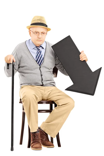 Senior mit Pfeil nach unten — Stockfoto