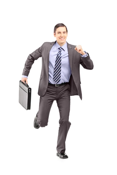 Businessman running with briefcase — Stock Photo, Image