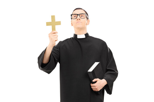 Priest holding a cross