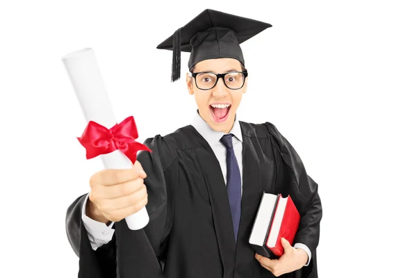 Male graduate student holding diploma — Stock Photo, Image