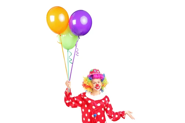 Kvinnlig clown med ballonger — Stockfoto