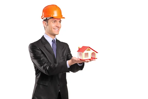 Foreman holding model of house — Stock Photo, Image