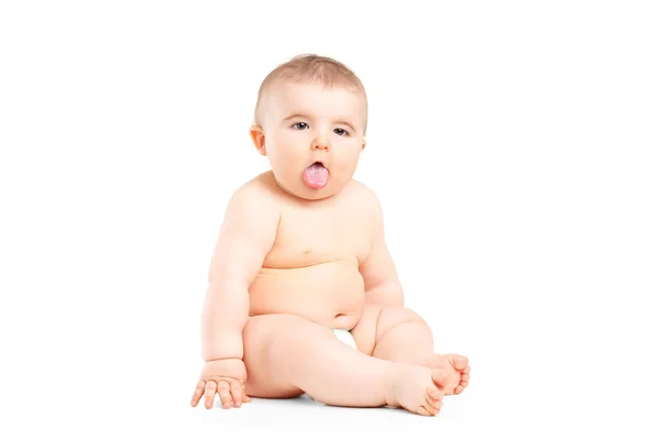 Baby boy sticking his tongue — Stock Photo, Image