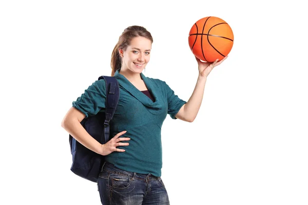 Okul kız holding basketbol — Stok fotoğraf