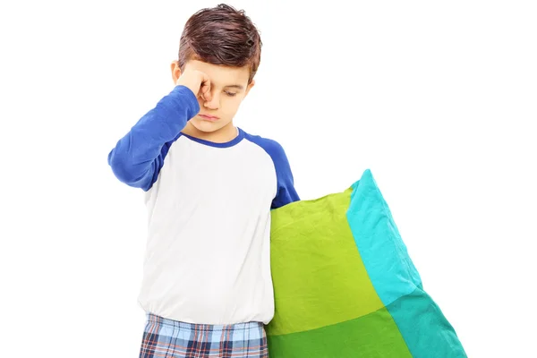 Niño somnoliento sosteniendo una almohada —  Fotos de Stock