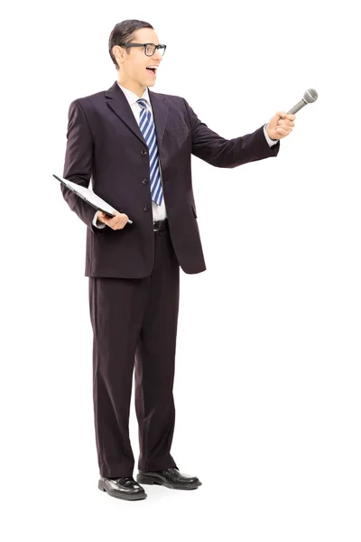 Conductor holding clipboard and microphone — Stock Photo, Image