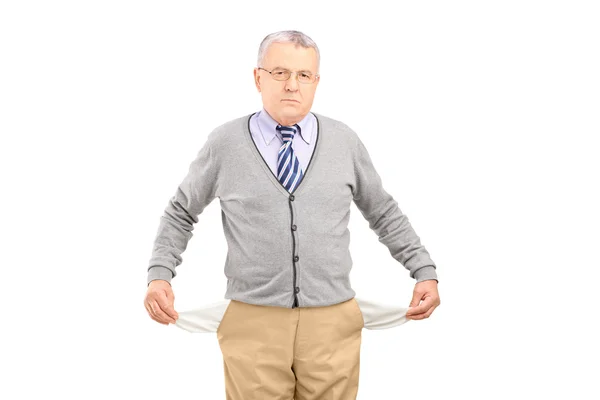 Senior man with empty pockets — Stock Photo, Image