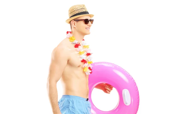 Guy holding swimming ring — Stock Photo, Image