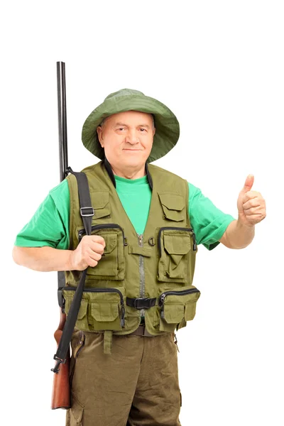 Mature hunter holding rifle — Stock Photo, Image