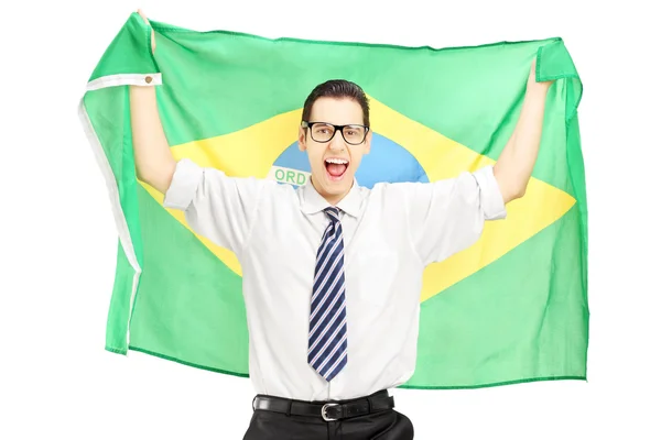 Excited male holding a brazilian flag — Stock Photo, Image