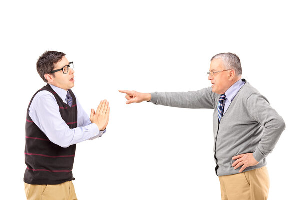 Angry man gesturing with finger to man