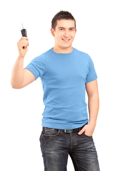 Smiling guy holding car key — Stock Photo, Image