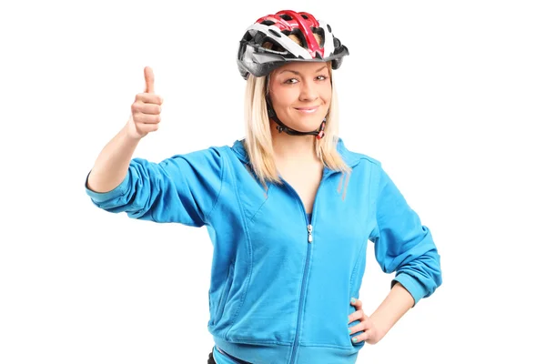 Female cyclist giving thumb up — Stock Photo, Image