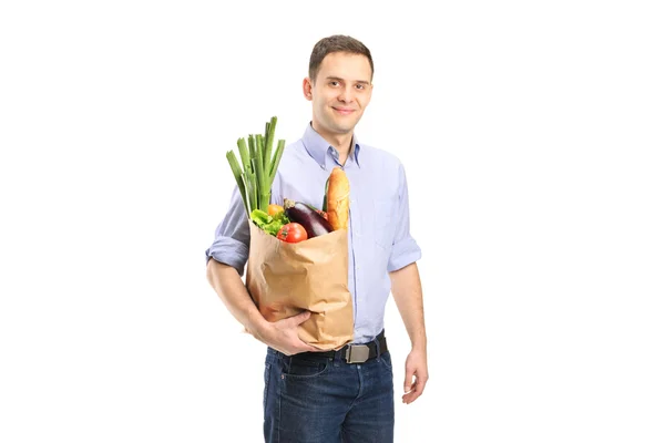 Człowiek gospodarstwa torba na zakupy — Zdjęcie stockowe
