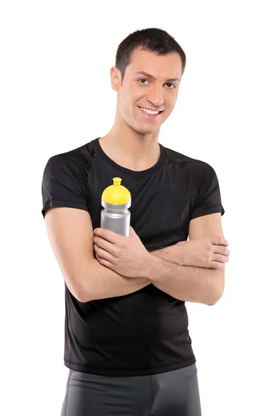 Homem posando com garrafa de plástico — Fotografia de Stock